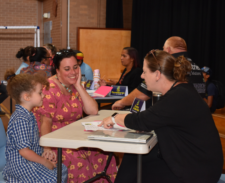 Parent, student and teacher working on student plan