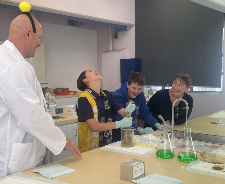 Primary students participating in a science experiment during an excursion to University of New England