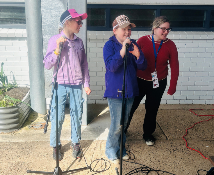 Students and staff participating in Karaoke rewards session