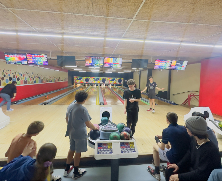 Secondary students play ten pin bowling during PBL rewards day