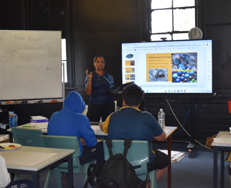 AEO delivering a cultural education lesson